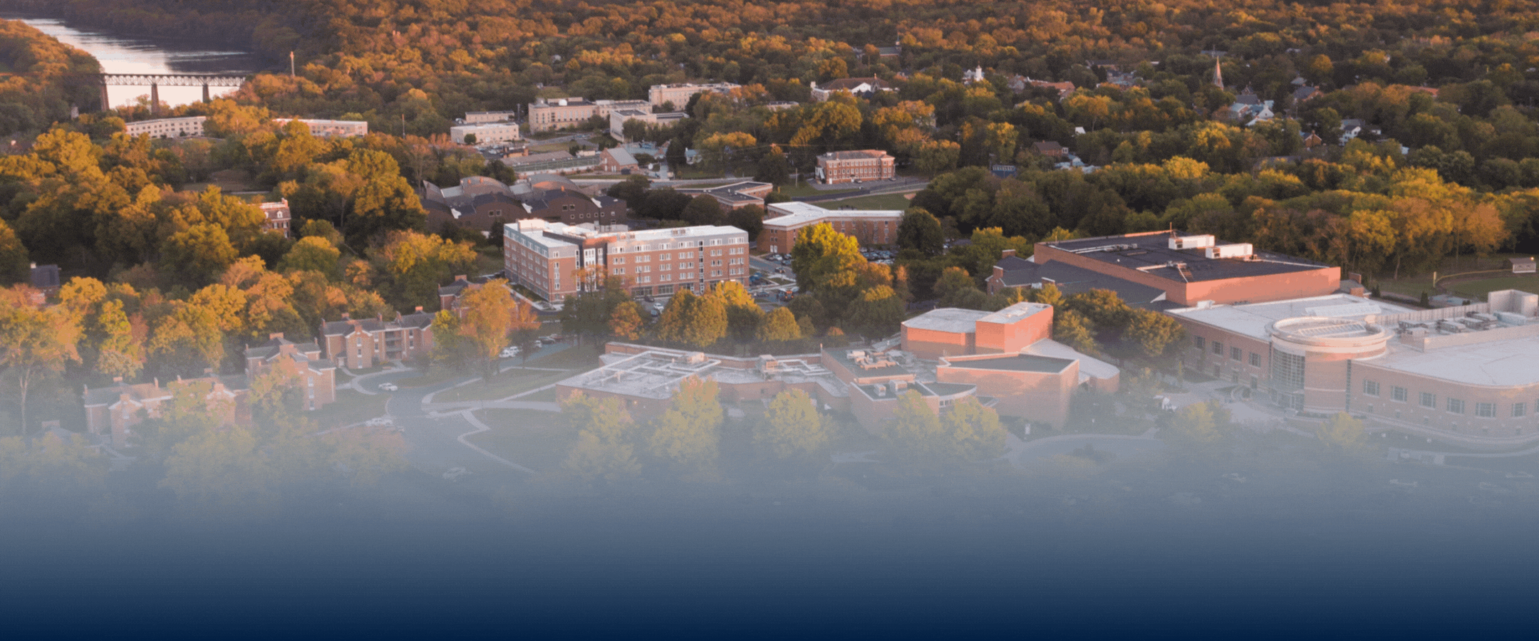Aerial photo of Shepherd University's campus with text stating "explore Shepherd, join us for a campus tour."