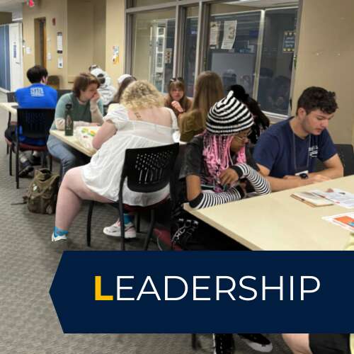 Group of LEADS students learning about college course scheduling, advising, and other 'need to know' things prior to the start of the fall semester.
