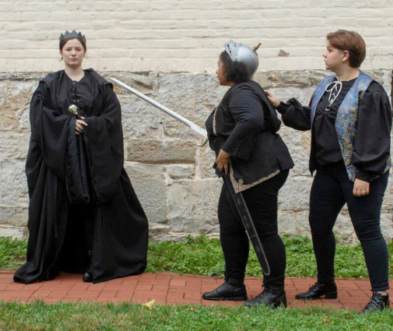 Mikayla Hamrick, Sade Herrick, and Olyvia Thompson rehearse "Hamlet."