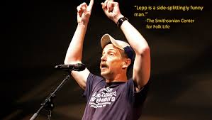 Image of Bil Lepp telling a tale tale with his hands pointing up to the sky. The quote from the Smithsonian Folklife Center above him reads: "Bl Lepp is a sidesplittingly funny man."