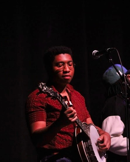 Joshua Jimmerson performs on banjo with the band Gangstagrass