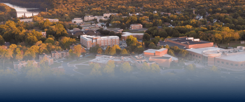 Aerial photo of Shepherd University's campus with text stating "explore campus, join us for an open house."