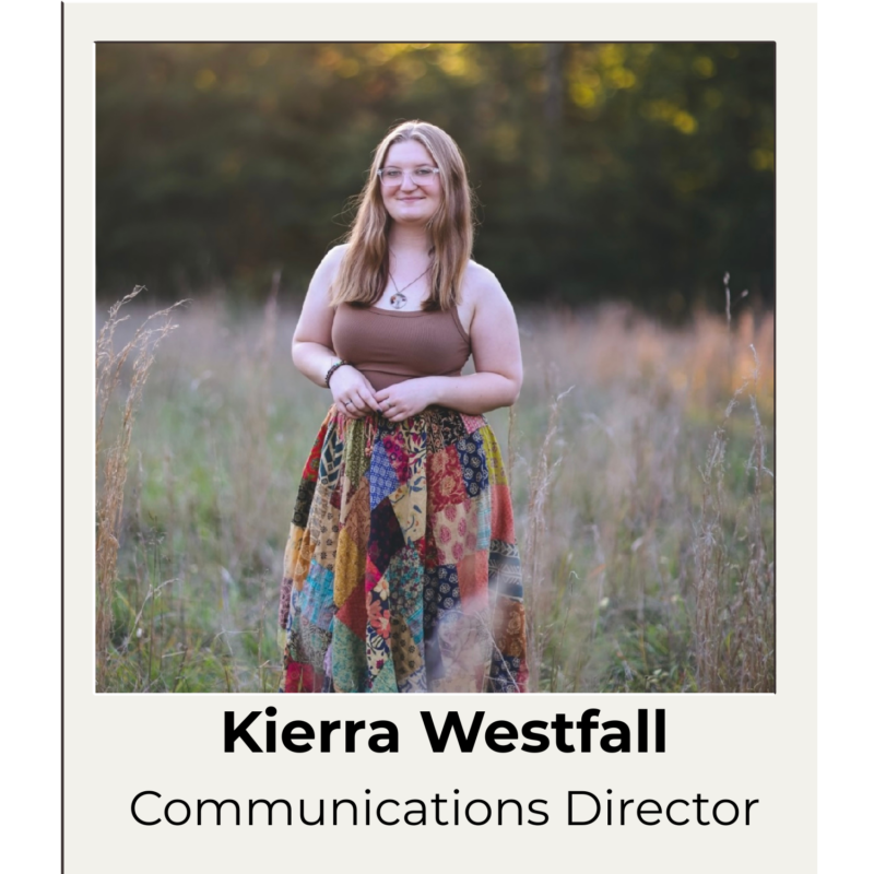 Kierra Westfall photo standing in field of wheat