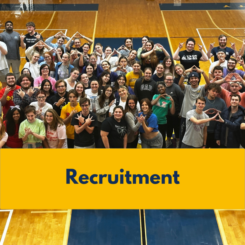 CLIICK HERE FOR RECRUITMENT INFO:  PHoto background is of Large Group of Shepherd students standing on basketball court from all Greek groups holding up their symbols.