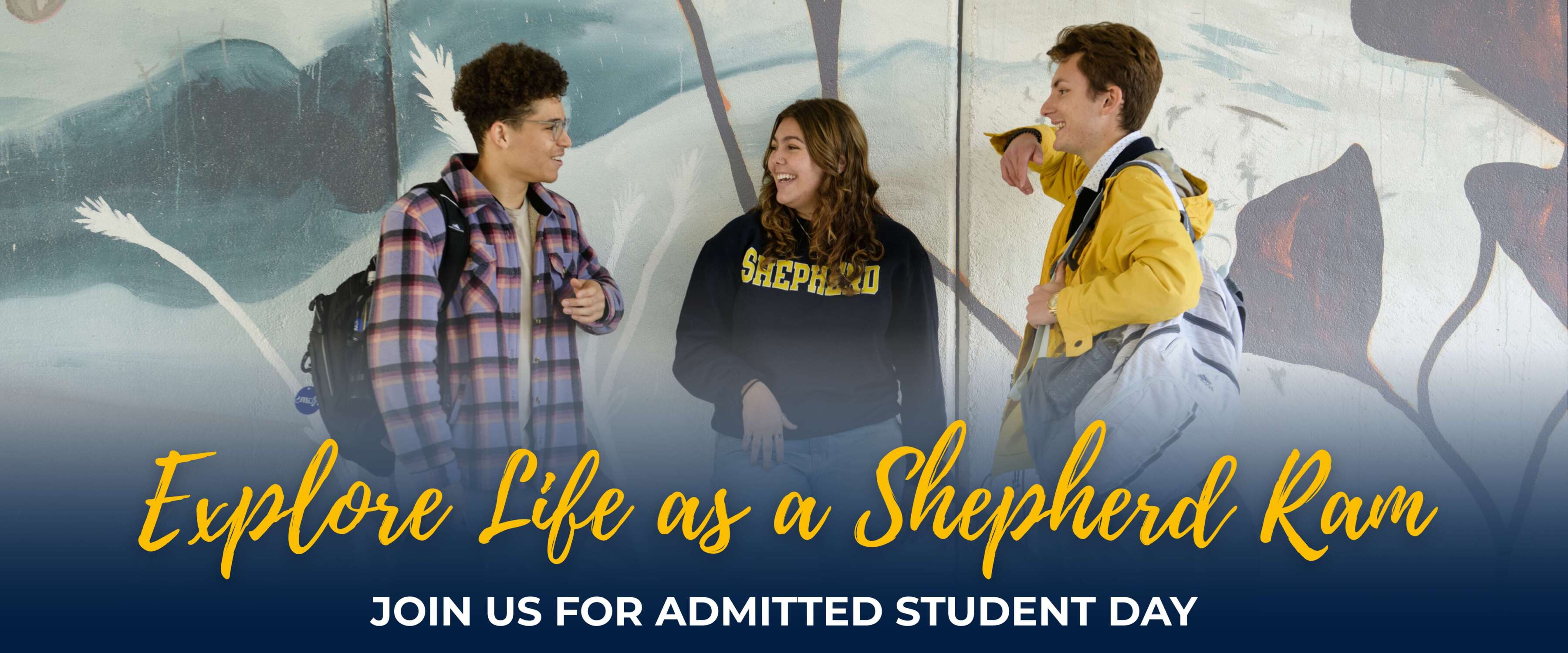 Group of Shepherd students leaning against a mural wall, with text below, "Explore Life as a Shepherd Ram. Join us for Admitted Student Day."